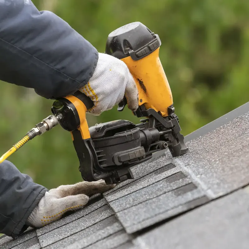 An asphalt roofing service being done in a roof of a Jersey home.