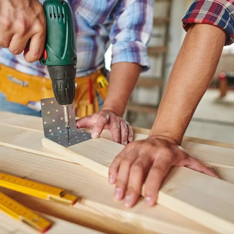 Top carpenters in Jersey working on an emergency woodwork for a St. Mary home.
