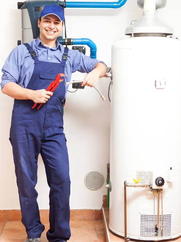 An local emergency heating engineer fixing a broken water heater in Jersey to restore hot water and heating fast.