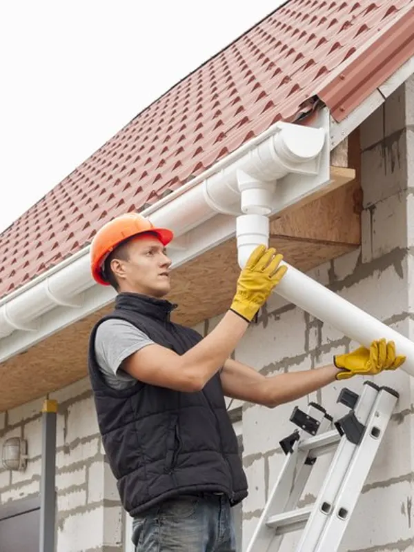 An expert roofer doing a roofing fascia in Jersey.