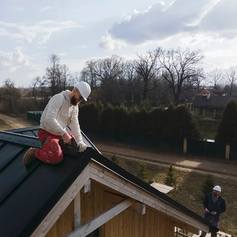 Expert roofer doing roofing repair service in Jersey.